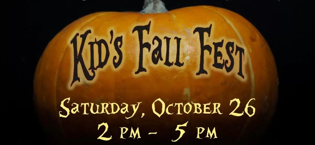 Pumpkin on dark background with text "Kids Fall Fest"